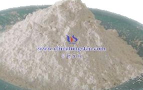 What Does Ammonium Metatungstate React to Under Acidic Conditions?